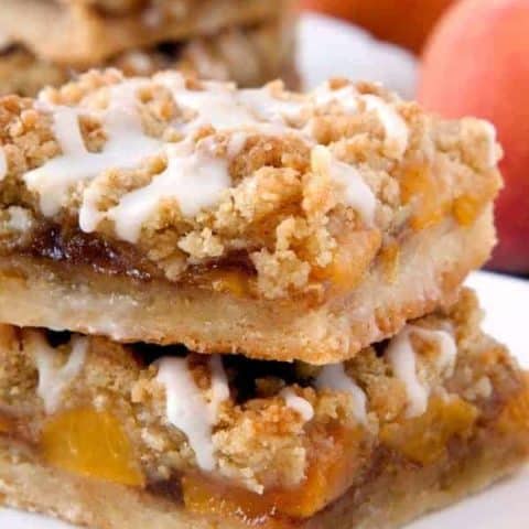 Peach Crumb Bars are topped with a sweet brown sugar crumble. Nothing could be better!