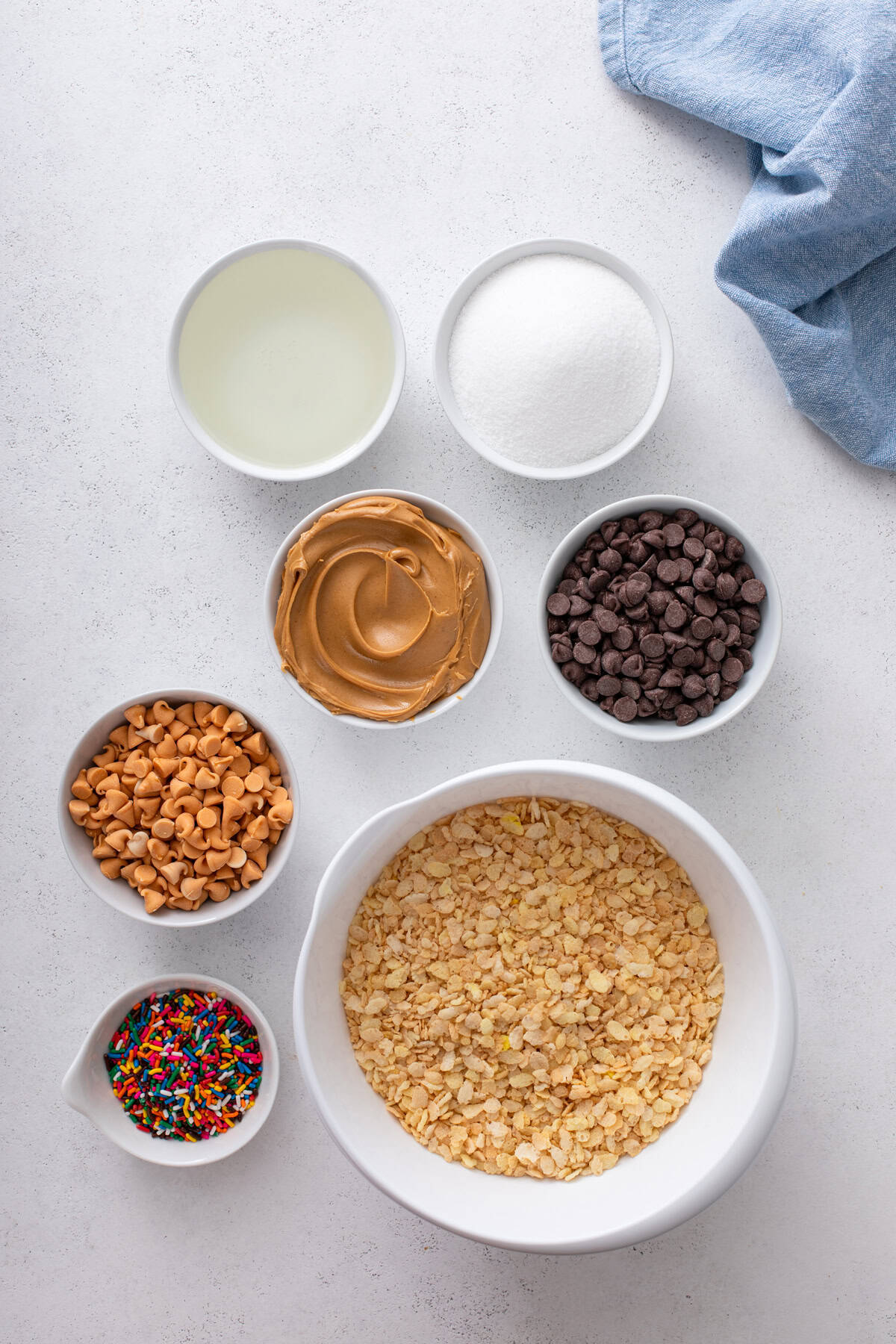 Ingredients for classic scotcheroos arranged on a countertop.