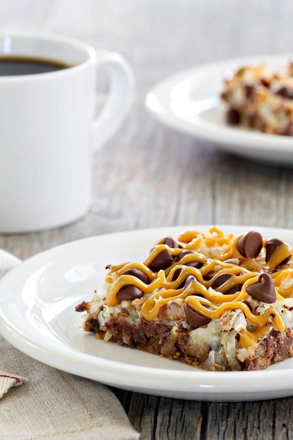 Coconut Caramel Pecan Cookie Bars are a quick and simple dessert thanks to refrigerated cookie dough. Pecans, coconut and caramel make them totally irresistible!