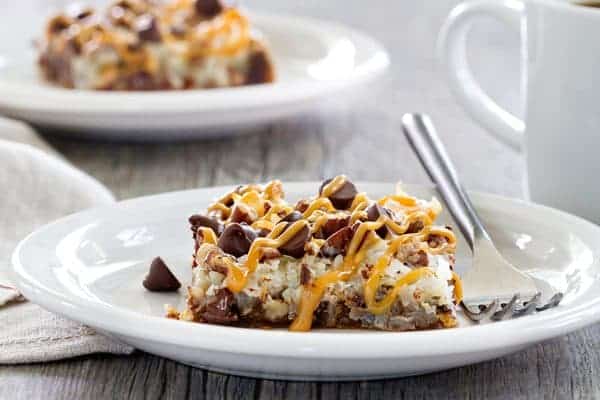 Coconut Caramel Pecan Cookie Bars are a quick and simple dessert thanks to refrigerated cookie dough. The perfect treat for a busy weeknight!