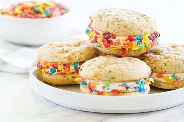 Fruity Pebbles Whoopie Pies are a playful and fruity spin on a classic dessert. Fruity Pebbles "sprinkles" make them irresistible.