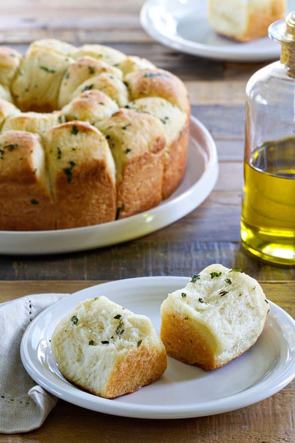 Garlic Parmesan Pull-Apart Bread is the perfect side for your Thanksgiving dinner, or a huge plate of lasagna! Say hello to your new favorite dinner roll recipe!