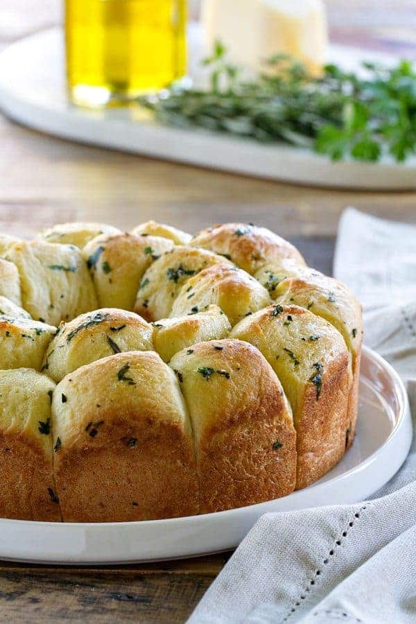 Garlic Parmesan Pull-Apart Bread is great for serving next to turkey and stuffing or spaghetti and meatballs. It's a crowd pleaser, that's for sure!