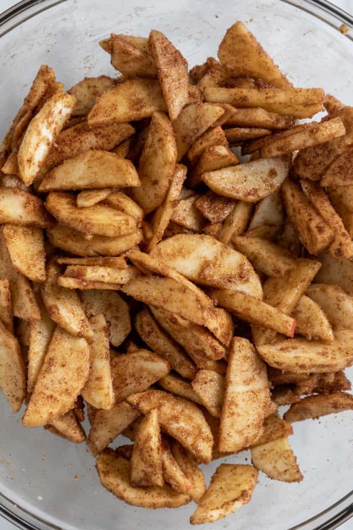 Apple galette filling in a glass bowl.