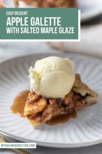 Scoop of vanilla ice cream on top of a sliced of plated apple galette. Text overlay includes recipe name.