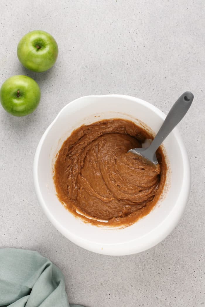 Batter base for caramel apple blondies in a white mixing bowl.