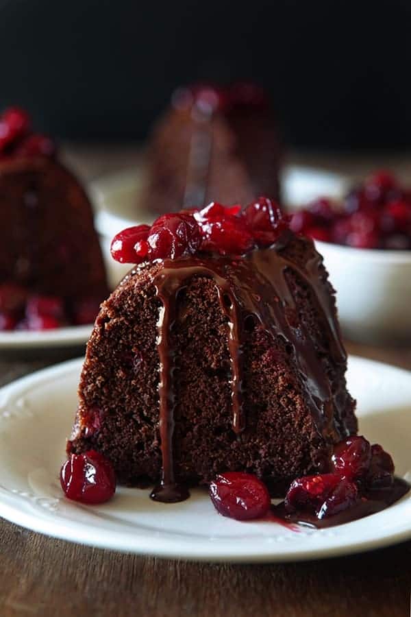 Dark Chocolate Cranberry Bundt Cake showcases the wonderful combination of dark chocolate and cranberries. A great Christmas Eve dessert.