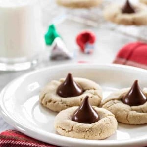 Chocolate Almond Kiss Cookies take that traditional holiday cookie and spin it on its head. Perfect for the holidays!