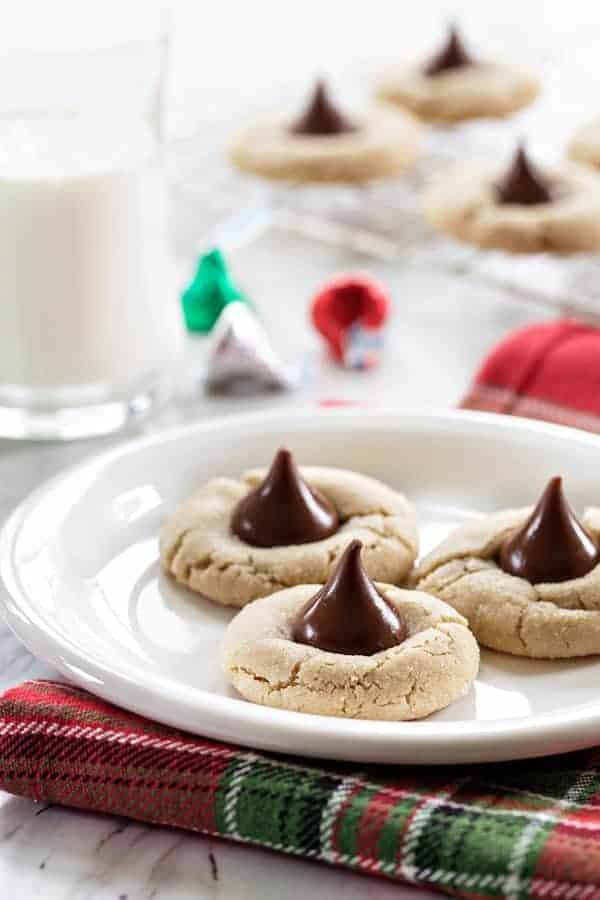 Chocolate Almond Kiss Cookies take that traditional holiday cookie and spin it on its head. Perfect for the holidays!