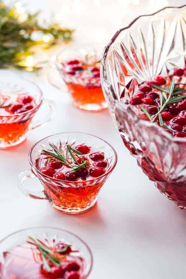 Sparkling Cranberry Rosemary Punch will elevate your holiday party to something truly special. So festive!