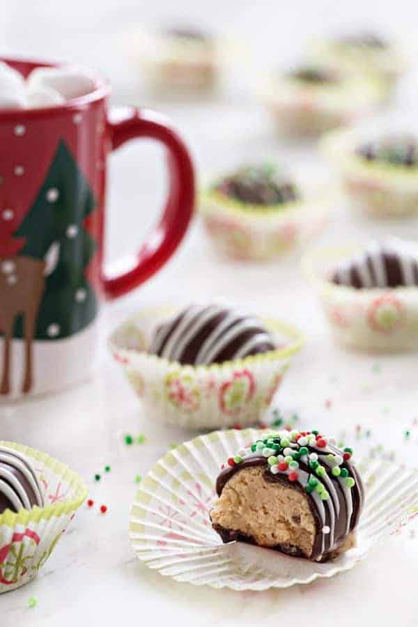 Chocolate Covered Peanut Butter Balls make a festive treat the whole family will love! Fun to make and eat!