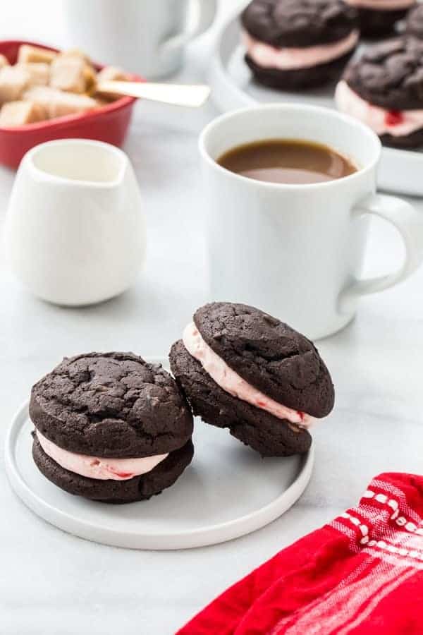 Chocolate Cherry Sandwich Cookies are a stunning way to show your love this Valentine's Day. The cherry buttercream is incredible!
