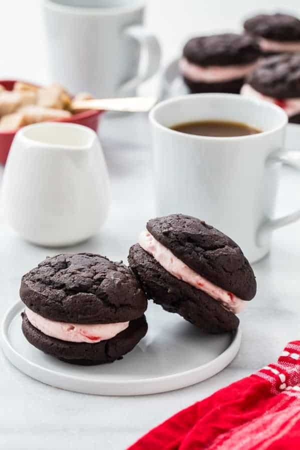 Chocolate Cherry Sandwich Cookies are a stunning way to show your love this Valentine's Day. Grown-ups and kids alike will love these sweet sandwich cookies!
