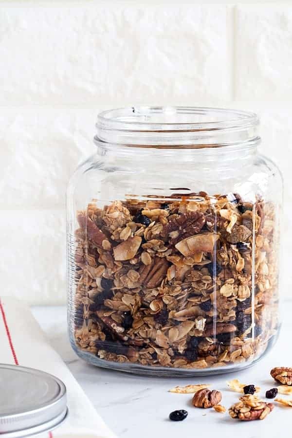 Coconut Pecan Granola is lightly sweetened and loaded with delicious flavor. It's perfect for a  snack, as cereal, or layered in a yogurt parfait.