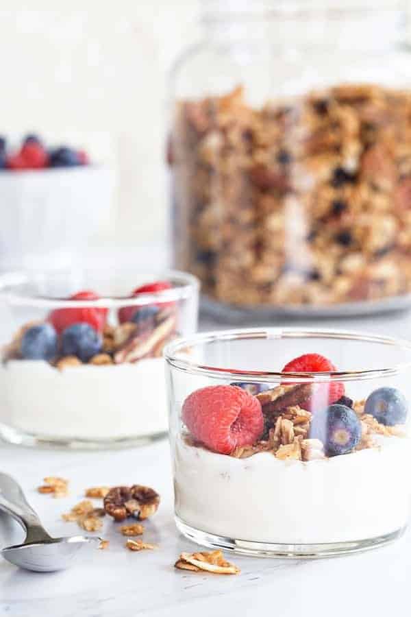 Coconut Pecan Granola is lightly sweetened and loaded with delicious flavor. Serve it up as a snack, as cereal, or as a parfait.