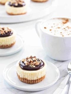 Mini Chocolate Pecan Cheesecakes will cure any nutty chocolate craving you've got going on. They're perfect for your next dinner party, too.