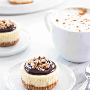 Mini Chocolate Pecan Cheesecakes will cure any nutty chocolate craving you've got going on. They're perfect for your next dinner party, too.