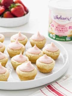Lemon Sugar Cookie Cups with Strawberry Frosting are just about the cutest Easter sweet you could make. These cuties are sure to be the hit on your dessert table.