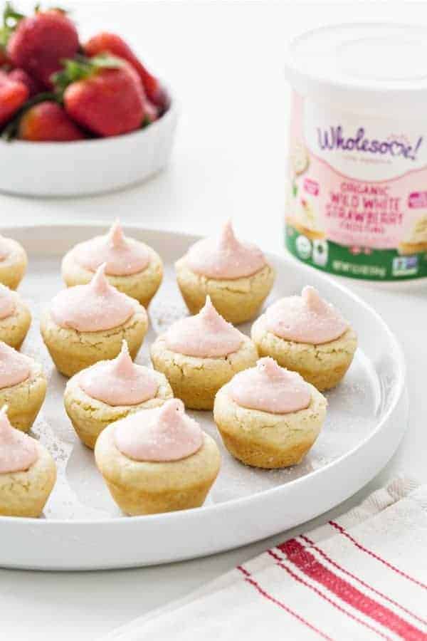 Lemon Sugar Cookie Cups with Strawberry Frosting are just about the cutest Easter sweet you could make.  These cuties are sure to be the hit on your dessert table. 