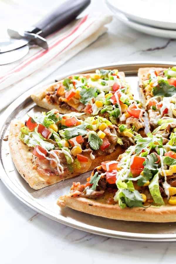 Taco Pizza Pie will make any kid and adult totally happy. A great weeknight dinner when you need something fast and satisfying!