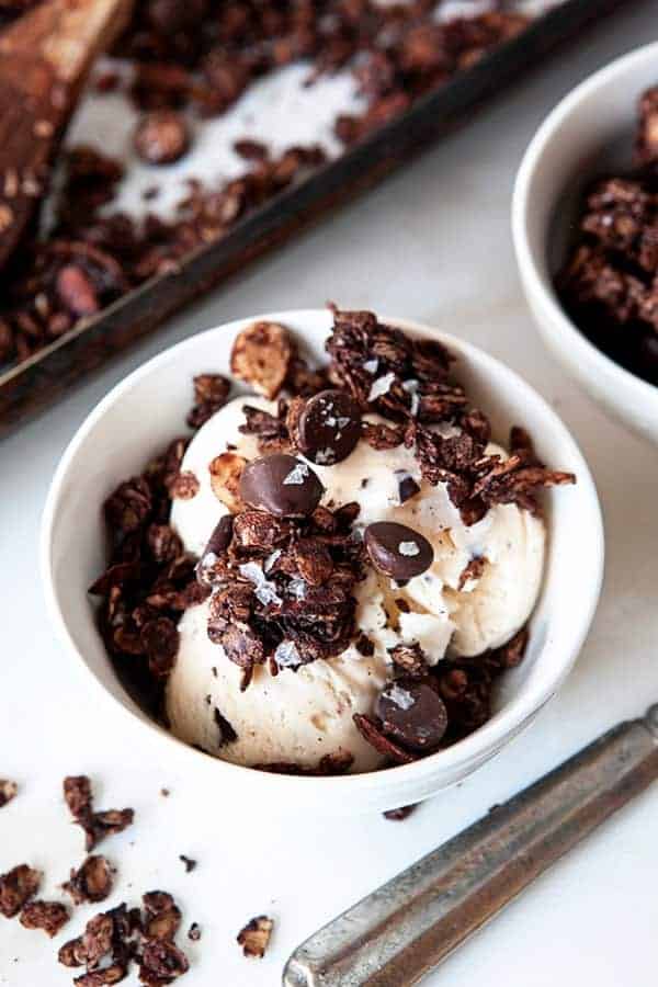 Salted Dark Chocolate Granola is a deliciously crunchy topping that is perfect for yogurt, ice cream, or just eating straight from the container!
