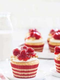 Cherry Cheesecake Cupcakes are a fun and portable take on my favorite dessert. They're perfect for summer barbecues and potlucks.