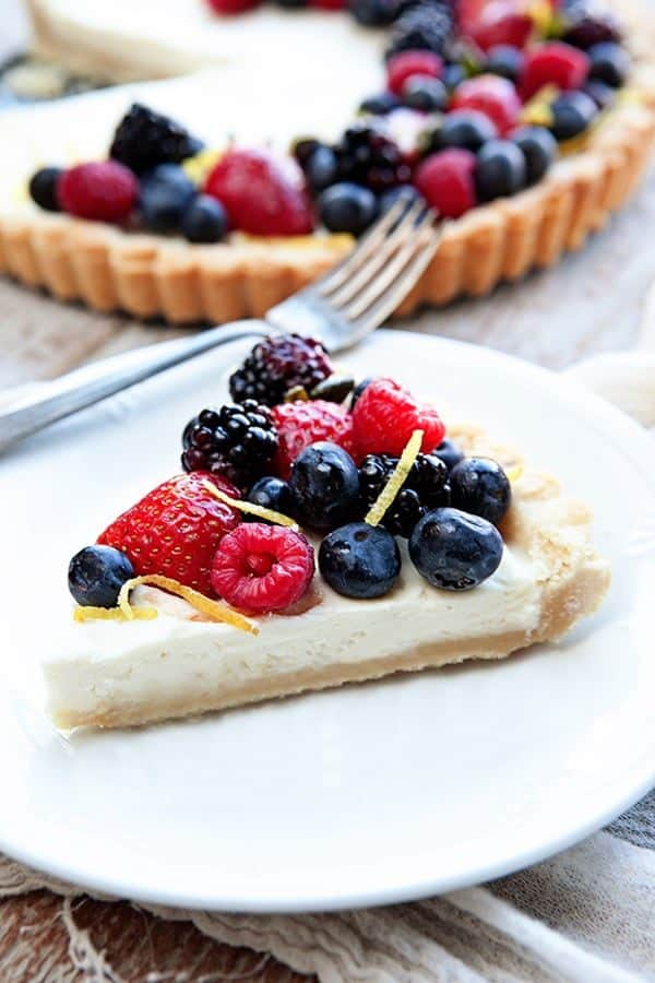 A Lemon Berry Mascarpone Tart is a simple, delicious way to show off all the season's best berries. Simple and perfect for summer entertaining!