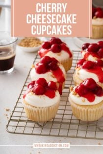 Cherry cheesecake cupcakes arranged on a wire cooling rack. Text overlay includes recipe name.