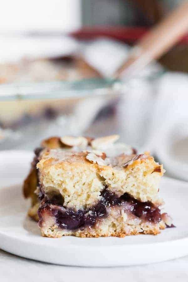 Cherry fritter cake is packed full of summer flavor. So simple and delicious!