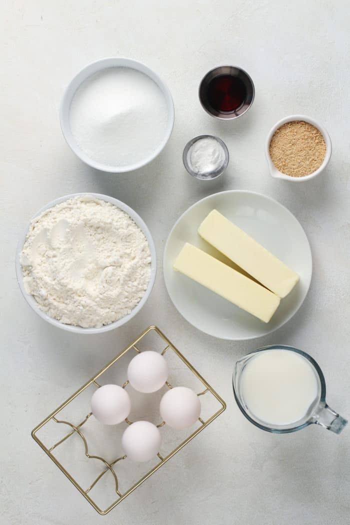 Ingredients for graham cracker cupcakes arranged on a gray countertop.