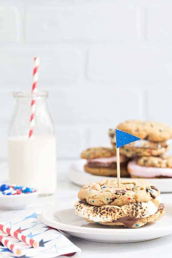 Chocolate Chip Cookie S'mores are loaded with dark chocolate chips and festive sprinkles and then topped with roasted marshmallows and more chocolate. Totally delicious!