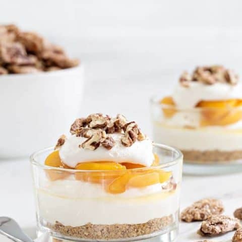 No Bake Peach Cheesecake captures everything there is to love about summer. Sweet peaches, crunchy pecans, and no need to bake a thing!