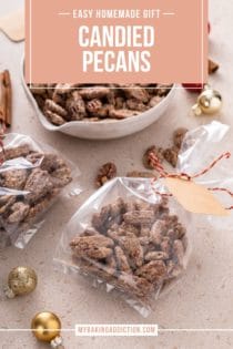Candied pecans packaged in two small plastic gift bags on a counter in front of a bowl of candied pecans. Text overlay includes recipe name.