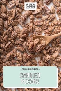 Wooden spoon stirring candied pecans on a parchment-lined baking sheet. Text overlay includes recipe name.