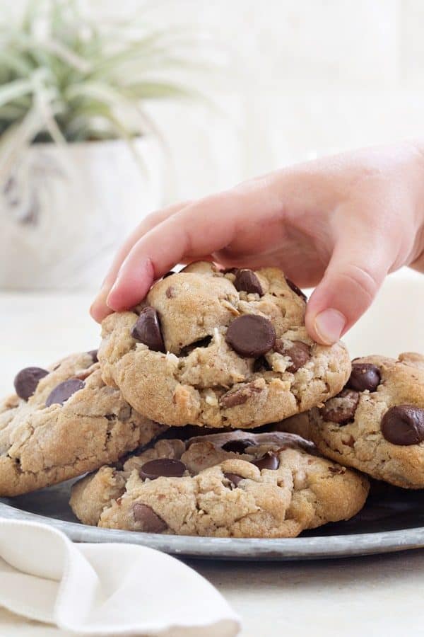 Caramel Coconut Chocolate Chip Cookies are brimming with chocolate, caramel chips, coconut and pecans to create the most popular cookie I've ever made. People will be begging you to make them!