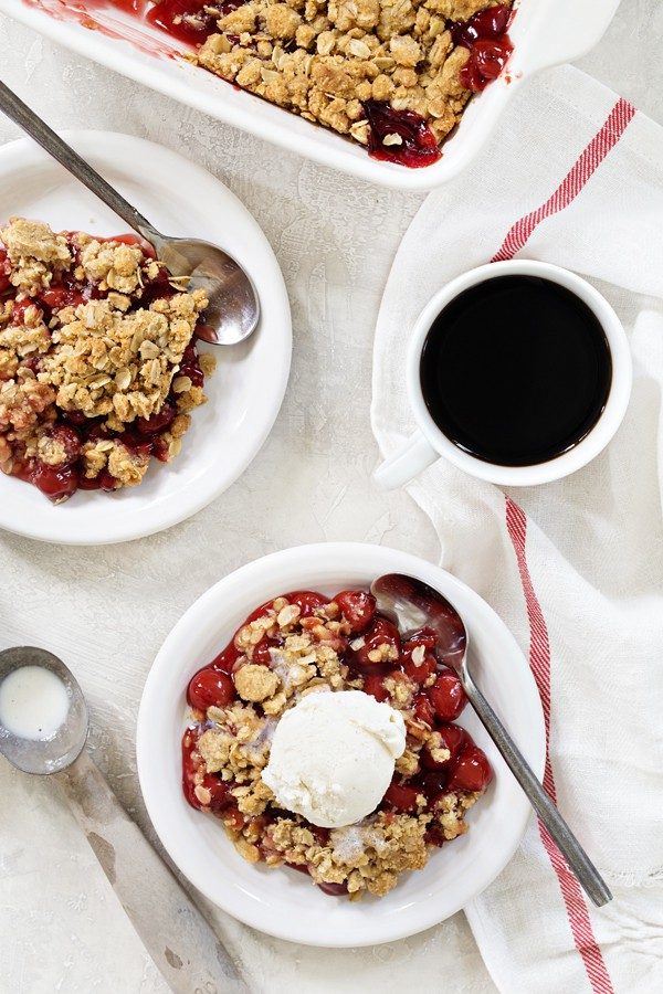 Cherry Crisp is simple, quick, and delicious. Add a scoop of vanilla bean ice cream for the perfect summer dessert!
