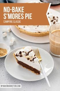 White plate with a slice of s'mores pie set on a gray countertop. Text overlay is added for pinterest.