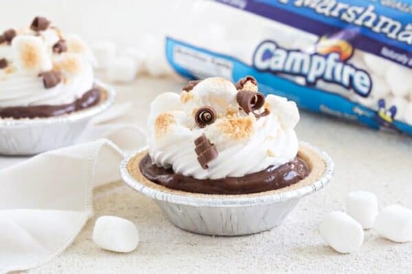 Mini S'mores Pies come together in less than 10 minutes and are the perfect no-bake dessert for summer.  Simple and delish!
