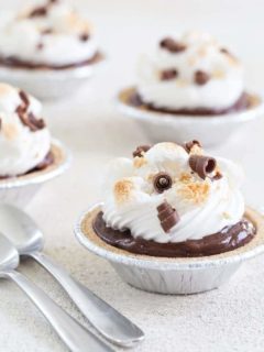 Mini S'mores Pies come together in less than 10 minutes and are the perfect no-bake dessert for summer. Ooey-gooey goodness!