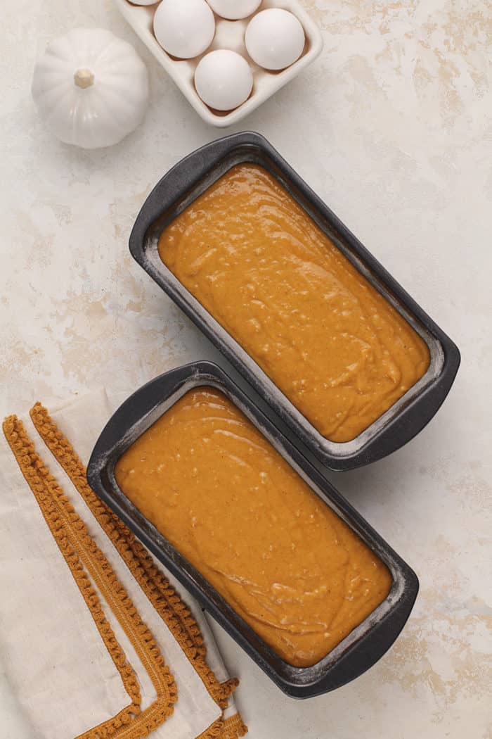 Batter for pumpkin bread in two loaf pans