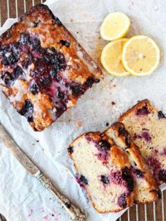 Triple Berry Banana Bread is a fun, fruity twist on the beloved classic. Perfect with your morning cup of coffee!