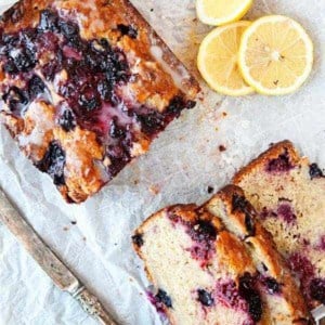 Triple Berry Banana Bread is a fun, fruity twist on the beloved classic. Perfect with your morning cup of coffee!