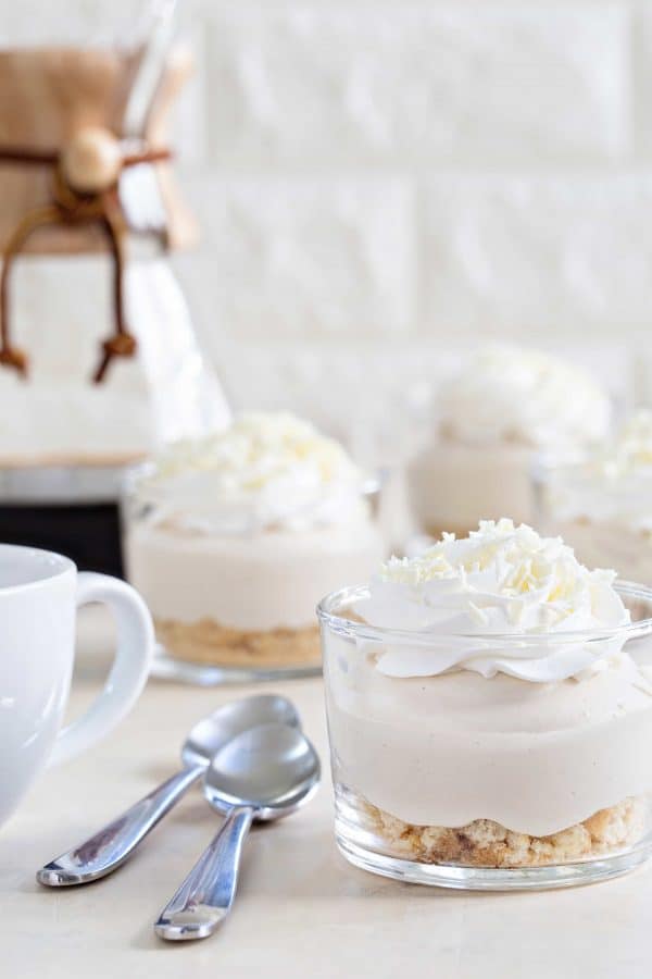 White Chocolate Tiramisu Pudding Cups come together in minutes for a delicious and simple dessert. They're perfect for holiday parties, or a Wednesday night.