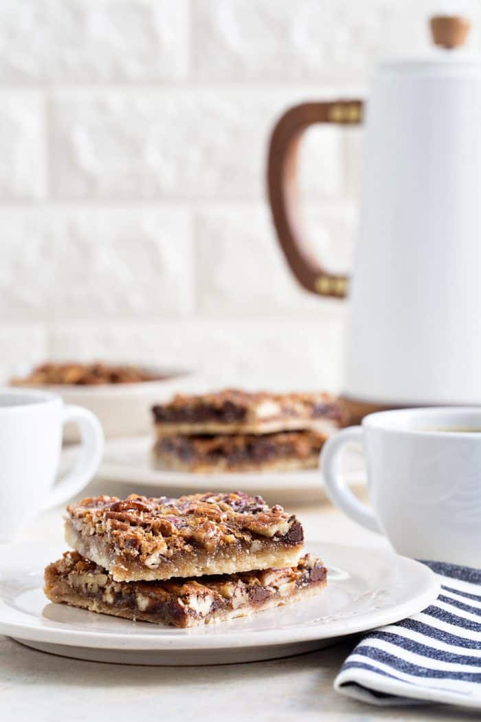 Chocolate Bourbon Pecan Bars are a fun twist on classic pecan pie. They're the perfect bar dessert for the holidays!