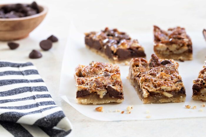 Chocolate Bourbon Pecan Bars are a fun twist on classic pecan pie. Perfect for a crowd!