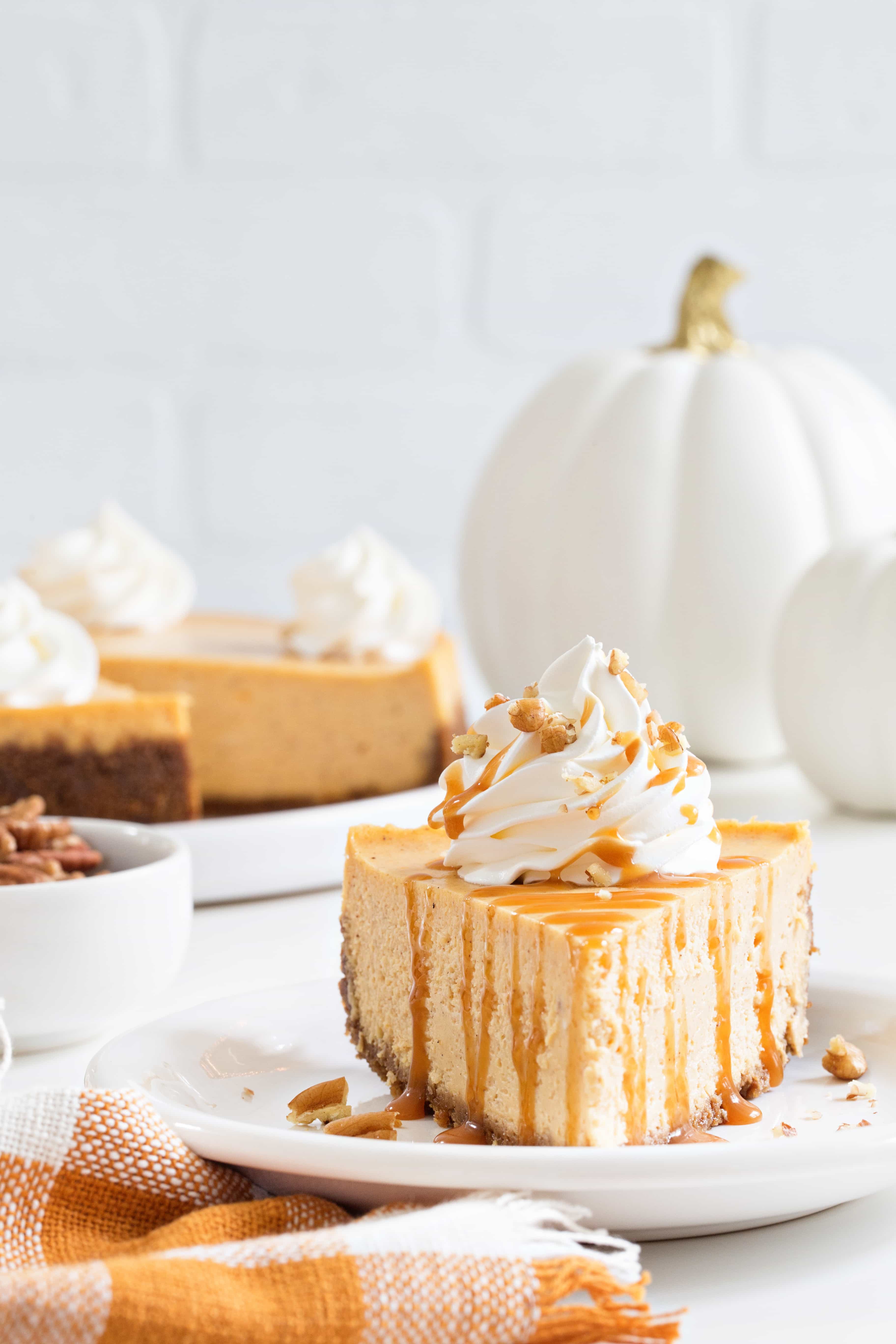 Sweet Potato Cheesecake is smooth, creamy and loaded with fall flavors. The buttery gingersnap crust makes it irresistible.