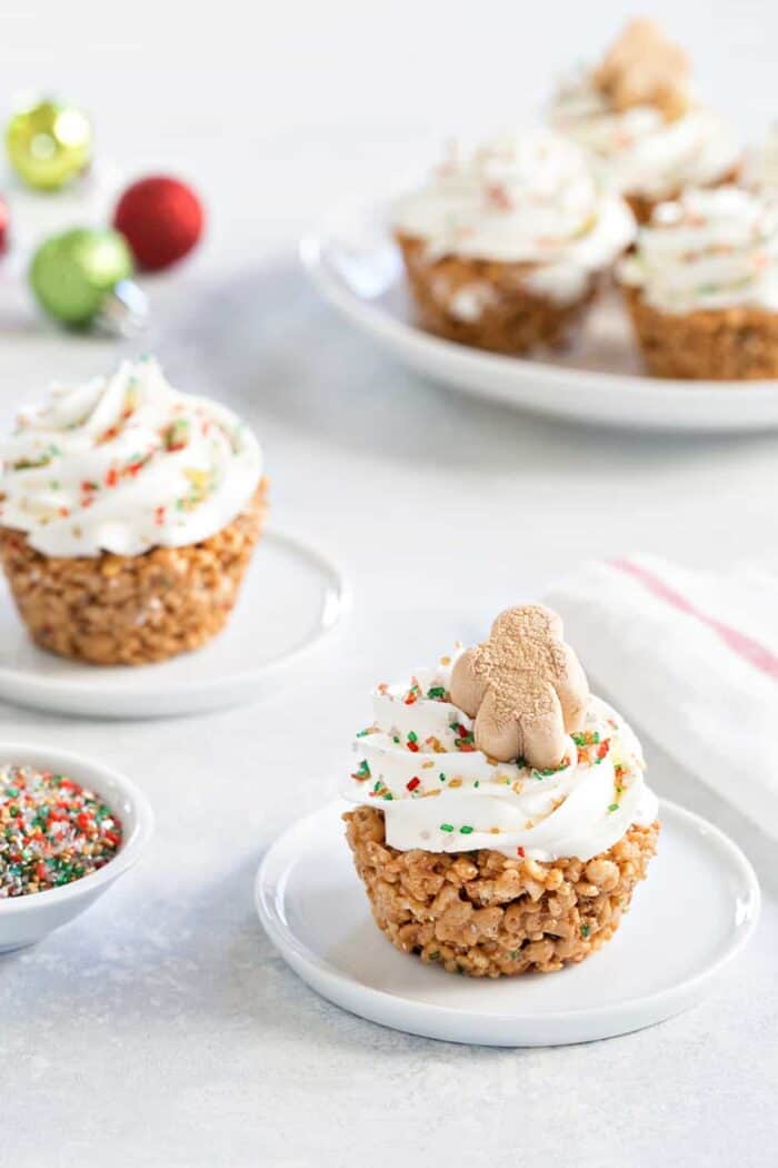 Gingerbread Marshmallow Treat Cupcakes are an adorable and delicious addition to any holiday dessert plate! So perfect for the holidays!