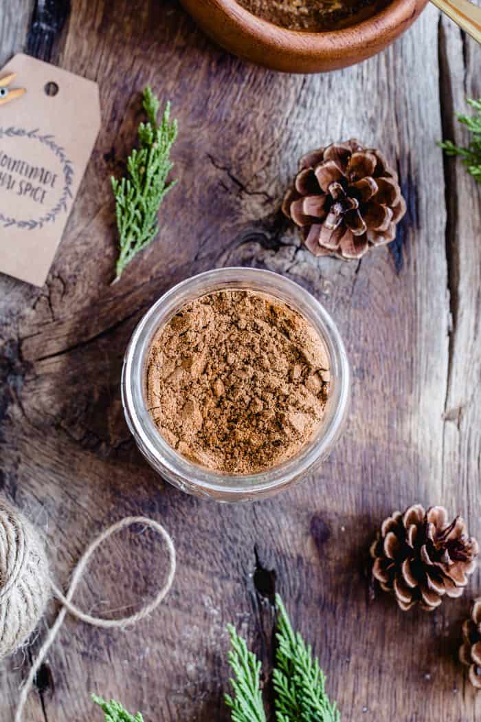 This homemade Chai Spice Blend is the perfect warm and cozy spice mixture for the holiday season.  Add a cute tag, twine and little greenery for the perfect handmade hostess gift!