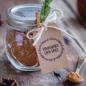 This homemade Chai Spice Blend is the perfect warm and cozy spice mixture for the holiday season. Add a cute tag, twine and little greenery for a super simple hostess gift!