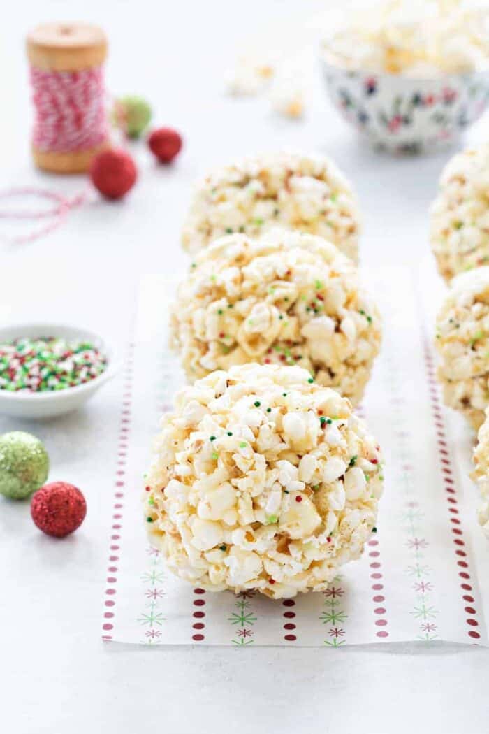 Popcorn Balls are a fun and delicious way to celebrate the season. This simple recipe is a great base for so many flavor combinations - the possibilities are endless!